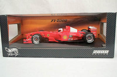 DCM18-HW-26738  SCALA: 1:18 - HOT WHEELS - MOD.: FERRARI F1 2000  RUBENS BARRICHELLO  - Colore:Rosso